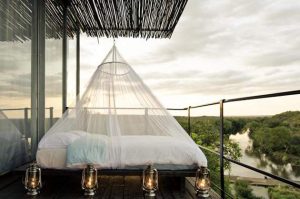 outdoor bed at Singita Lebombo on a safari honeymoon 